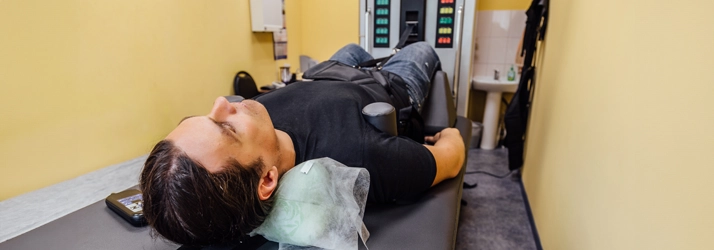 Man Lying In A Decompression Machine